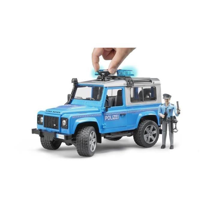 BRUDER - 2597 - Véhicule police LAND ROVER Defender Station avec Policier - Echelle 1:16